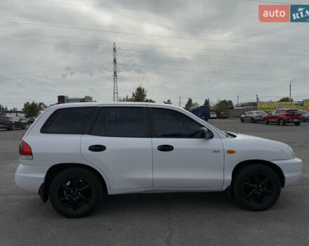 Белый Хендай Санта Фе, объемом двигателя 2 л и пробегом 323 тыс. км за 8000 $, фото 2 на Automoto.ua