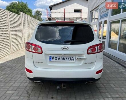 Білий Хендай Санта Фе, об'ємом двигуна 2.4 л та пробігом 176 тис. км за 12500 $, фото 6 на Automoto.ua