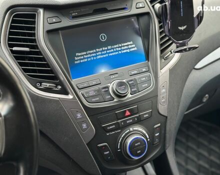 Білий Хендай Санта Фе, об'ємом двигуна 2 л та пробігом 209 тис. км за 14980 $, фото 24 на Automoto.ua