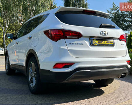 Белый Хендай Санта Фе, объемом двигателя 2.4 л и пробегом 88 тыс. км за 17500 $, фото 4 на Automoto.ua