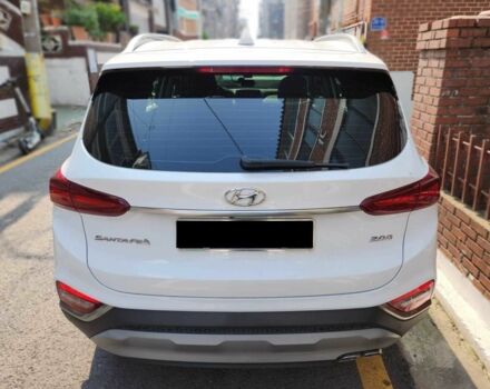 Белый Хендай Санта Фе, объемом двигателя 2 л и пробегом 87 тыс. км за 11200 $, фото 4 на Automoto.ua