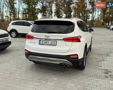 Белый Хендай Санта Фе, объемом двигателя 2 л и пробегом 129 тыс. км за 27400 $, фото 3 на Automoto.ua