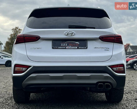 Белый Хендай Санта Фе, объемом двигателя 2.2 л и пробегом 169 тыс. км за 31034 $, фото 6 на Automoto.ua