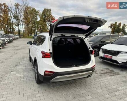 Белый Хендай Санта Фе, объемом двигателя 2 л и пробегом 129 тыс. км за 27400 $, фото 10 на Automoto.ua