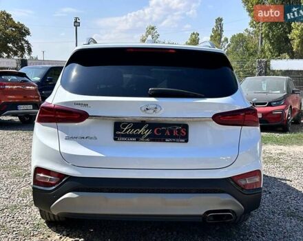 Белый Хендай Санта Фе, объемом двигателя 2.4 л и пробегом 80 тыс. км за 27500 $, фото 5 на Automoto.ua