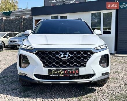 Белый Хендай Санта Фе, объемом двигателя 2.4 л и пробегом 80 тыс. км за 27500 $, фото 1 на Automoto.ua