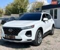Белый Хендай Санта Фе, объемом двигателя 2.4 л и пробегом 80 тыс. км за 27500 $, фото 1 на Automoto.ua