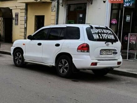 Білий Хендай Санта Фе, об'ємом двигуна 2 л та пробігом 251 тис. км за 7100 $, фото 1 на Automoto.ua