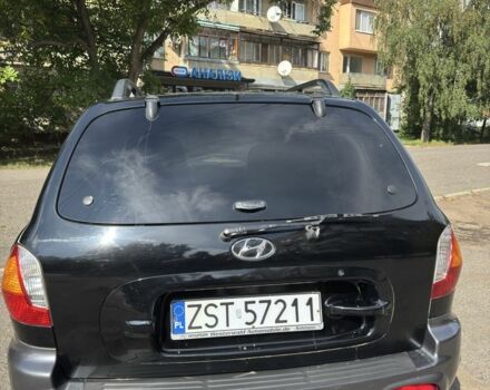 Черный Хендай Санта Фе, объемом двигателя 2 л и пробегом 257 тыс. км за 3700 $, фото 7 на Automoto.ua
