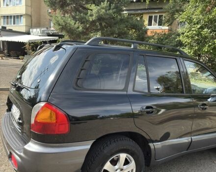 Черный Хендай Санта Фе, объемом двигателя 2 л и пробегом 257 тыс. км за 3700 $, фото 2 на Automoto.ua