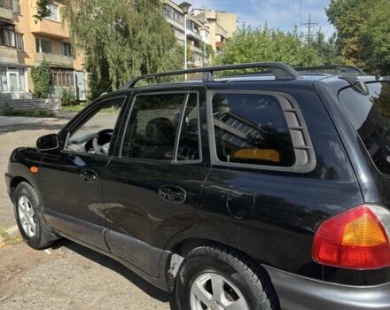 Черный Хендай Санта Фе, объемом двигателя 2 л и пробегом 257 тыс. км за 3700 $, фото 3 на Automoto.ua