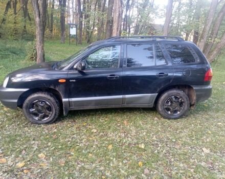 Черный Хендай Санта Фе, объемом двигателя 2 л и пробегом 300 тыс. км за 3200 $, фото 2 на Automoto.ua