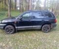 Черный Хендай Санта Фе, объемом двигателя 2 л и пробегом 300 тыс. км за 3200 $, фото 2 на Automoto.ua