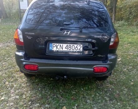 Черный Хендай Санта Фе, объемом двигателя 2 л и пробегом 300 тыс. км за 3200 $, фото 3 на Automoto.ua