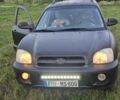Черный Хендай Санта Фе, объемом двигателя 2 л и пробегом 305 тыс. км за 3098 $, фото 8 на Automoto.ua