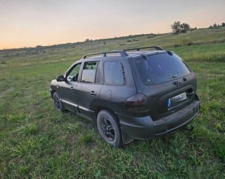 Чорний Хендай Санта Фе, об'ємом двигуна 2 л та пробігом 305 тис. км за 3190 $, фото 3 на Automoto.ua