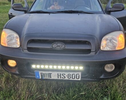 Чорний Хендай Санта Фе, об'ємом двигуна 2 л та пробігом 305 тис. км за 3190 $, фото 6 на Automoto.ua