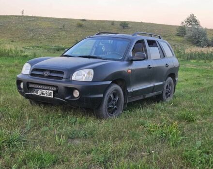Чорний Хендай Санта Фе, об'ємом двигуна 2 л та пробігом 305 тис. км за 3190 $, фото 1 на Automoto.ua