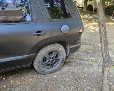 Чорний Хендай Санта Фе, об'ємом двигуна 2 л та пробігом 305 тис. км за 3190 $, фото 10 на Automoto.ua