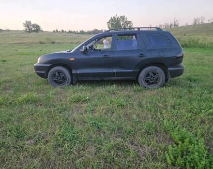 Черный Хендай Санта Фе, объемом двигателя 2 л и пробегом 305 тыс. км за 3098 $, фото 9 на Automoto.ua