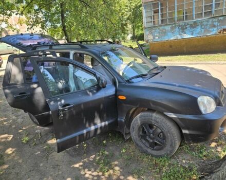 Чорний Хендай Санта Фе, об'ємом двигуна 2 л та пробігом 305 тис. км за 3190 $, фото 11 на Automoto.ua