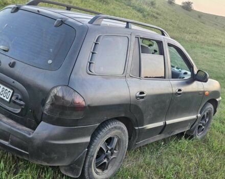 Чорний Хендай Санта Фе, об'ємом двигуна 2 л та пробігом 305 тис. км за 3190 $, фото 2 на Automoto.ua