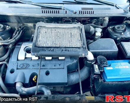 Черный Хендай Санта Фе, объемом двигателя 2 л и пробегом 280 тыс. км за 5600 $, фото 4 на Automoto.ua