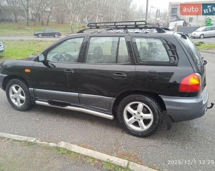 Черный Хендай Санта Фе, объемом двигателя 1.99 л и пробегом 359 тыс. км за 4500 $, фото 3 на Automoto.ua