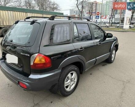 Черный Хендай Санта Фе, объемом двигателя 2 л и пробегом 260 тыс. км за 5000 $, фото 2 на Automoto.ua