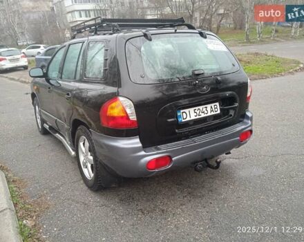 Черный Хендай Санта Фе, объемом двигателя 1.99 л и пробегом 359 тыс. км за 4500 $, фото 4 на Automoto.ua