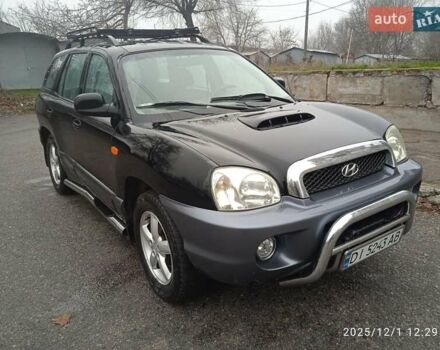 Черный Хендай Санта Фе, объемом двигателя 1.99 л и пробегом 359 тыс. км за 4500 $, фото 1 на Automoto.ua