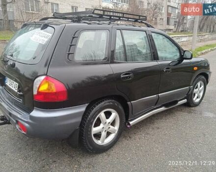 Черный Хендай Санта Фе, объемом двигателя 1.99 л и пробегом 359 тыс. км за 4500 $, фото 2 на Automoto.ua
