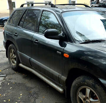 Черный Хендай Санта Фе, объемом двигателя 2 л и пробегом 265 тыс. км за 5500 $, фото 1 на Automoto.ua