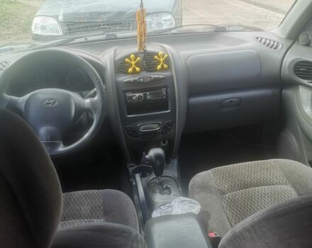 Черный Хендай Санта Фе, объемом двигателя 2.7 л и пробегом 281 тыс. км за 4700 $, фото 5 на Automoto.ua