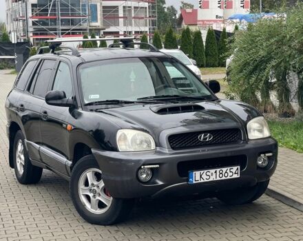 Черный Хендай Санта Фе, объемом двигателя 2 л и пробегом 300 тыс. км за 2925 $, фото 2 на Automoto.ua