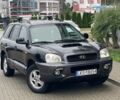 Черный Хендай Санта Фе, объемом двигателя 2 л и пробегом 300 тыс. км за 2925 $, фото 2 на Automoto.ua