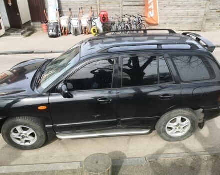 Черный Хендай Санта Фе, объемом двигателя 2.7 л и пробегом 281 тыс. км за 4700 $, фото 4 на Automoto.ua