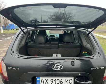 Чорний Хендай Санта Фе, об'ємом двигуна 2 л та пробігом 350 тис. км за 6999 $, фото 17 на Automoto.ua