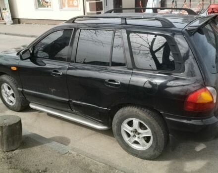 Черный Хендай Санта Фе, объемом двигателя 2.7 л и пробегом 281 тыс. км за 4700 $, фото 1 на Automoto.ua