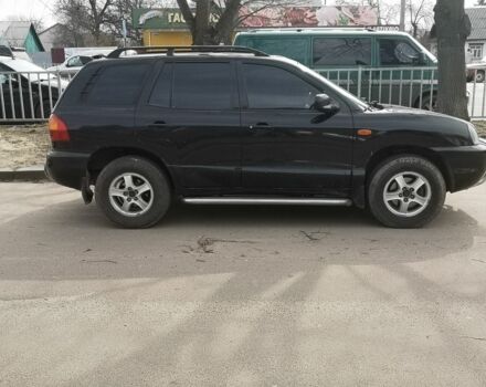 Черный Хендай Санта Фе, объемом двигателя 2.7 л и пробегом 281 тыс. км за 4700 $, фото 3 на Automoto.ua