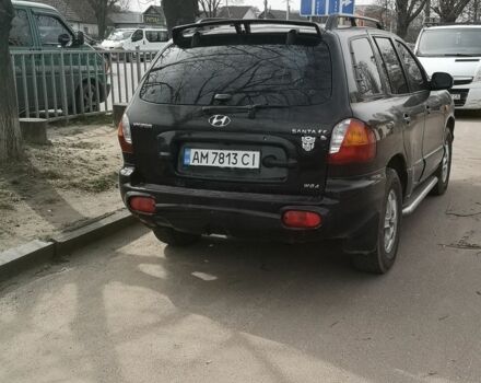 Черный Хендай Санта Фе, объемом двигателя 2.7 л и пробегом 281 тыс. км за 4700 $, фото 2 на Automoto.ua