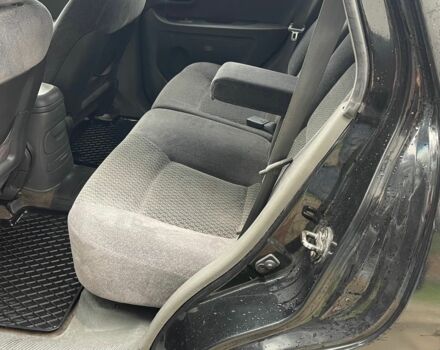 Черный Хендай Санта Фе, объемом двигателя 2 л и пробегом 300 тыс. км за 2925 $, фото 3 на Automoto.ua