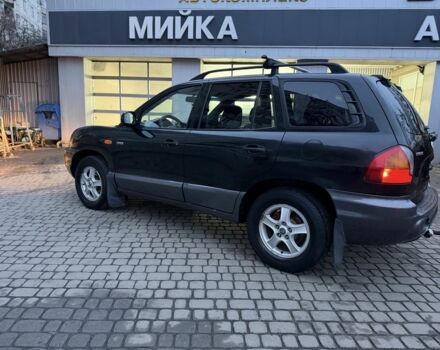 Черный Хендай Санта Фе, объемом двигателя 2 л и пробегом 340 тыс. км за 3500 $, фото 1 на Automoto.ua