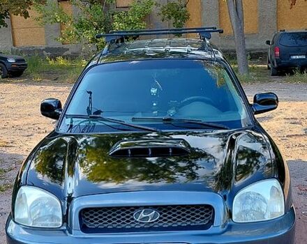 Черный Хендай Санта Фе, объемом двигателя 2 л и пробегом 388 тыс. км за 4000 $, фото 1 на Automoto.ua