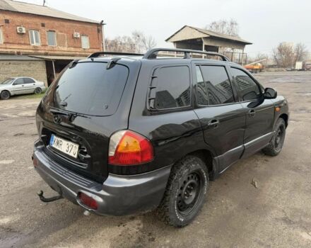 Черный Хендай Санта Фе, объемом двигателя 2 л и пробегом 266 тыс. км за 3200 $, фото 4 на Automoto.ua