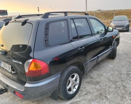 Черный Хендай Санта Фе, объемом двигателя 2.4 л и пробегом 240 тыс. км за 4400 $, фото 8 на Automoto.ua