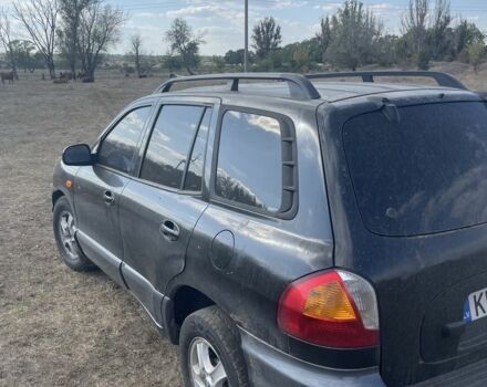 Черный Хендай Санта Фе, объемом двигателя 2.7 л и пробегом 150 тыс. км за 1500 $, фото 1 на Automoto.ua