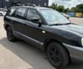 Черный Хендай Санта Фе, объемом двигателя 2.7 л и пробегом 300 тыс. км за 3500 $, фото 2 на Automoto.ua