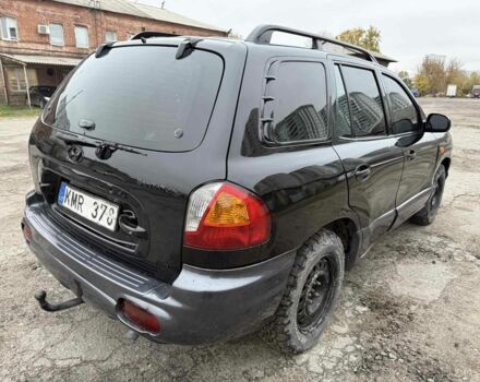Черный Хендай Санта Фе, объемом двигателя 2 л и пробегом 278 тыс. км за 2500 $, фото 5 на Automoto.ua