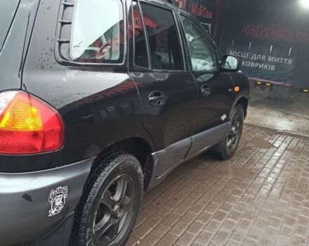 Чорний Хендай Санта Фе, об'ємом двигуна 2 л та пробігом 345 тис. км за 2700 $, фото 2 на Automoto.ua